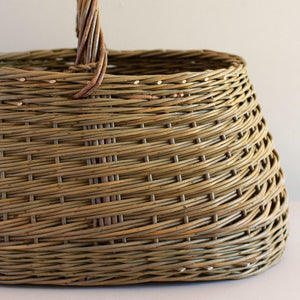 Woven willow basket with handle, handmade by basket maker Catherine Beaumont, using English grown natural willow.