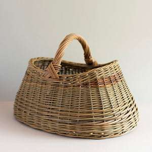 Woven willow basket with handle, handmade using various natural willow varieties to create coloured details. Handmade by Catherine Beaumont. 