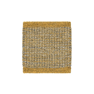Kasthall’s Golden Ash Harper rug has a gold flecked, tweed-like appearance. This timeless design is flat woven with a thin, low profile, and is made from pure wool. Sample of rug shown. 