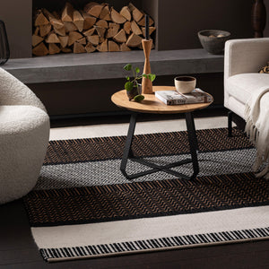 Patterned weave Recork Sugo Clara Rug made from sustainable cork in modern living room space.