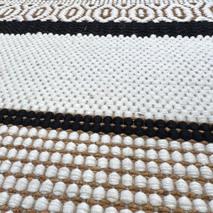 Patterned weave detail of a Recork Sugo Maria Rug made from sustainable cork. 