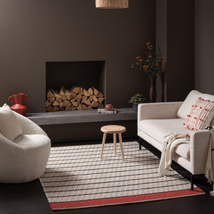 Patterned weave Recork Sugo Sofia Rug made from sustainable cork in modern living room space.