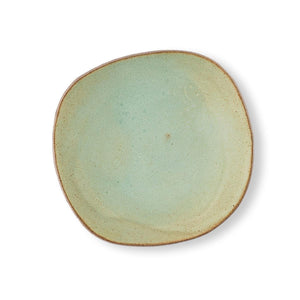 Green glazed handmade ceramic Hana Karim plate with an unglazed grey clay rim.