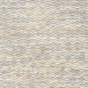 A close up image of Fabula Living’s Beige/Grey Gimle Rug which  uses two shades woven together to create a distinctive marled effect, this rug has a thick, flat pile and is reversible -designed by Jens Landberg Schrøder.