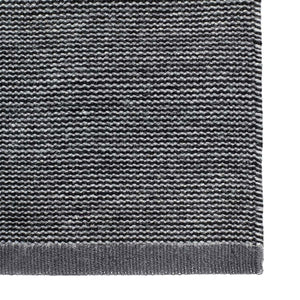 Fabula Living’s Black/Grey Erica Rug has a thin striped pattern which perfectly balances with neutral Gabbeh-dyed wool yarns in this versatile flat weave rug - designed by Lisbet Friis.