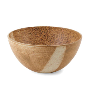 The Brown Oda Salad Bowl is a large size bowl with a minimalist form and distinctive use of colours and glazes - by Julie Damhus.