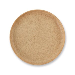 Julie Damhus’ Brown Toto Plate is minimalist in form and decorated with speckled colour glaze.