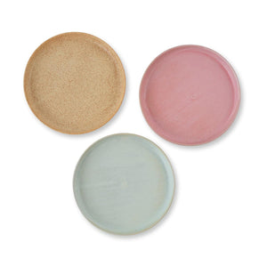 Julie Damhus' Toto Plates are minimalist in form and decorated with speckled colour glazes.