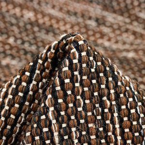 Rezas' Brown White Atlas Rug is a handwoven modern kelim with a flecked tonal colour effect. Close up of weave detail. 