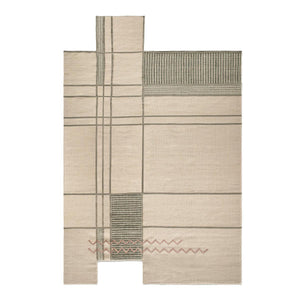 Tacto's Caminos Beige Rug, the irregular shaped rug is predominantly a warm beige, with asymmetric lines and patches of soft, sage green and dusky pink embroidered zigzag patterns at one end - designed by Yonoh