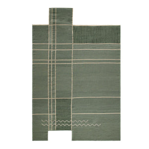 Tacto's Caminos Green Rug is an irregular shaped rug which is predominantly sage green, with cream asymmetric lines and embroidered zigzag patterns at one end - designed by Yonoh.