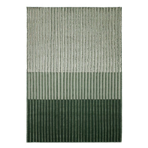 Tacto's Campos Blush Rug, this linear, textured and tonal striped rug is handwoven with an 8 mm wool pile. Colours graduate from deep forest green to pale celadon. - designed by Aranda Aloy Enblanc.