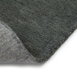 A close look at the texture and colour of the Fabula Living’s Charcoal Ask Rug, which uses a mixture of wool and linen fibres to create this varying tonal effect in the pile - designed by Jens Landberg Schrøder.