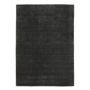 Fabula Living’s Nanna Rug has a lovely charcoal colour and textured wool pile  -designed by Jens Landberg Schrøder