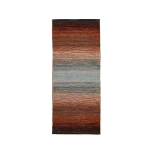 Rezas' Brown Panorama Kelim Rug is a handwoven rug which has an autumnal colour pattern, that transitions from chestnut red browns, graduating into rusty pinks, and contrasting with evening sky blues.