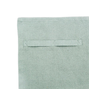 The Organic Company dusty mint Dinner Napkin pictured close up to show the herringbone weave pattern.