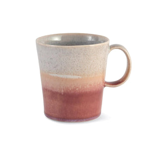 The mug features SGW Lab’s signature colour-contrast glaze. Tones transition from speckled grey through to apricot and a deep earthy red. Every handmade mug is unique as the glaze will vary slightly from mug to mug