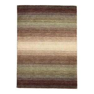 The Green Panorama Rug features a graduation of harmonious colours from rich, warm chestnut browns through to mossy greens and sandy beige.