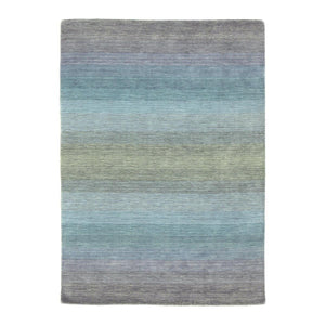 Grey Blue Panorama Rug has a gently striped colour pattern in harmonious hues that transition from warm grey and lavender through to ocean blues and olive greens - by Rezas