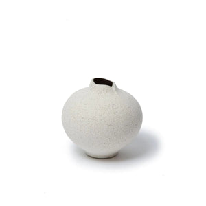 Lindform’s Line sand vase has a speckled off-white matt finish.