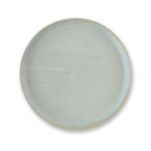 Julie Damhus’ Mint Toto Plate is minimalist in form and decorated with speckled colour glaze.
