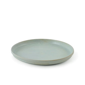 Julie Damhus’ Mint Toto Plate is minimalist in form and decorated with speckled colour glaze.