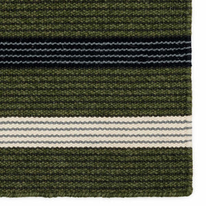 Fabula Living’s Moss/Black Fleur Rug has stripes-within-stripes. The well-balanced pattern is woven in harmonious moss green and black. Detailed close up of the weave.
