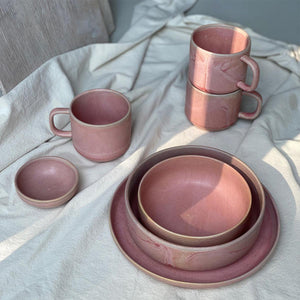 Julie Damhus’ Rose pink Toto collection - bowls, plates and mugs decorated with speckled colour glazes.